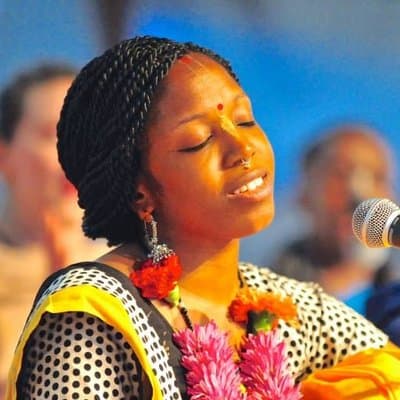 A devotee singing kirtan
