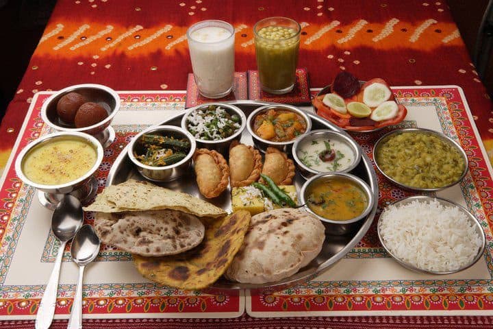 A prasadam feast laid out on leaves